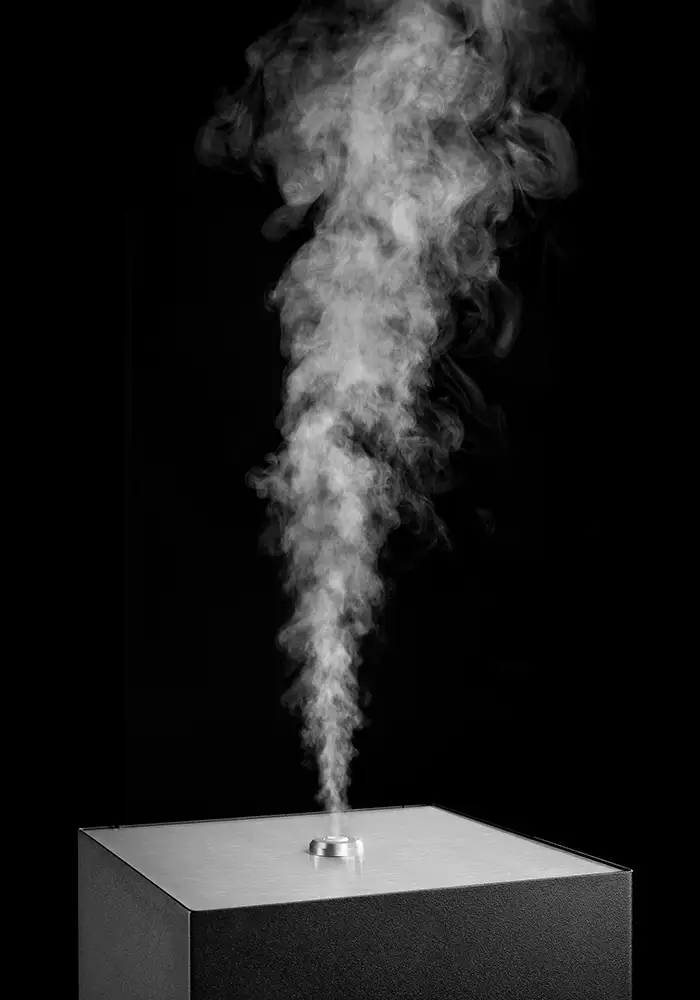 Exklusive und hochwertige Raumdüfte in einer blauen Sprühflasche für professionelles Duftmarketing und eine positive Wirkung auf Kunden.